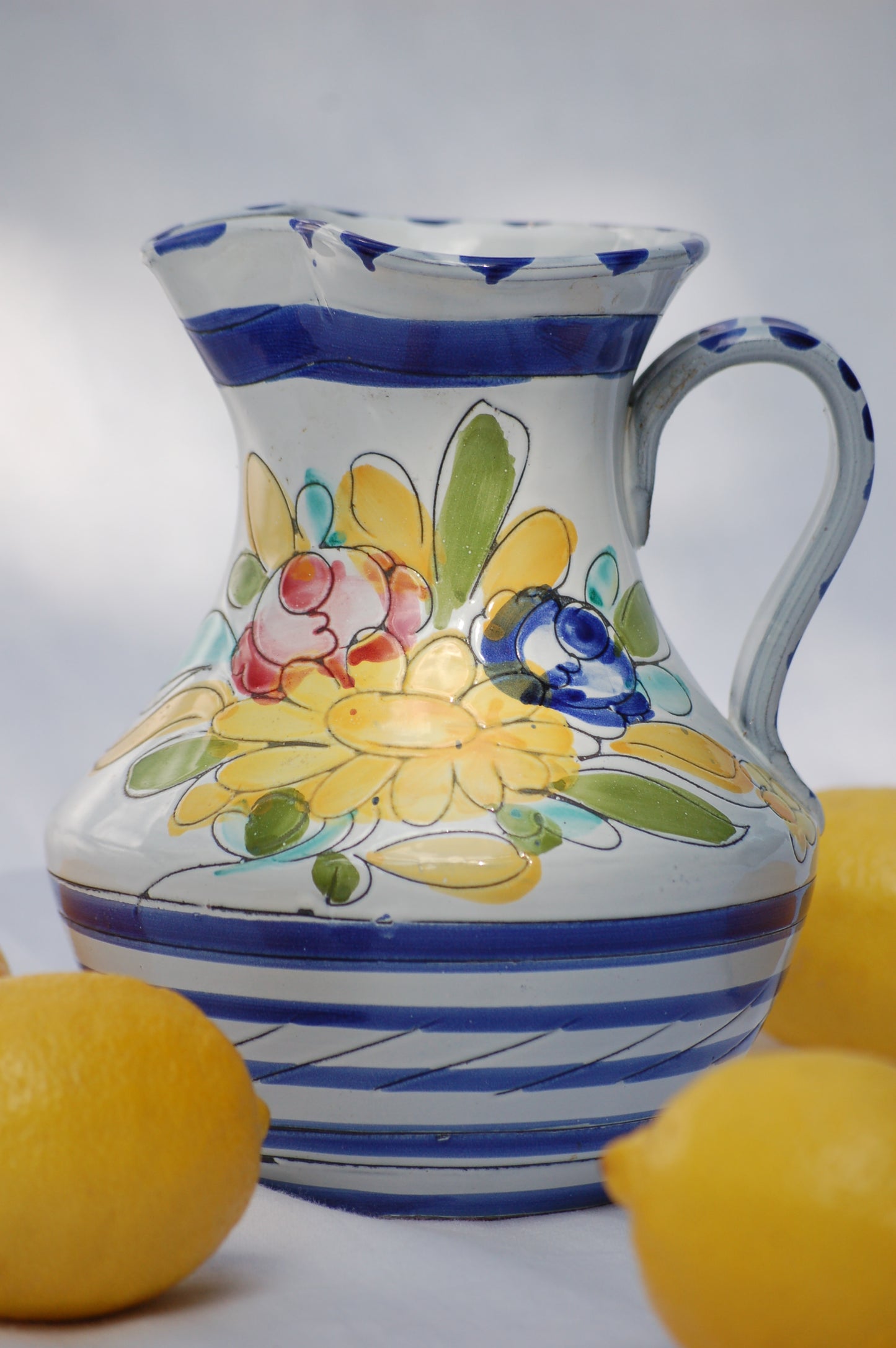 For an instant feeling of, Mediterrenean table by the sea feeling, just add this cute pitcher on your table and the sun will shine. This vintage item is as new and comes from the 1980's. This pitcher comes from France. It is hand painted and has been drawn with scratched graffito technique which gives it a very lively look and feel.