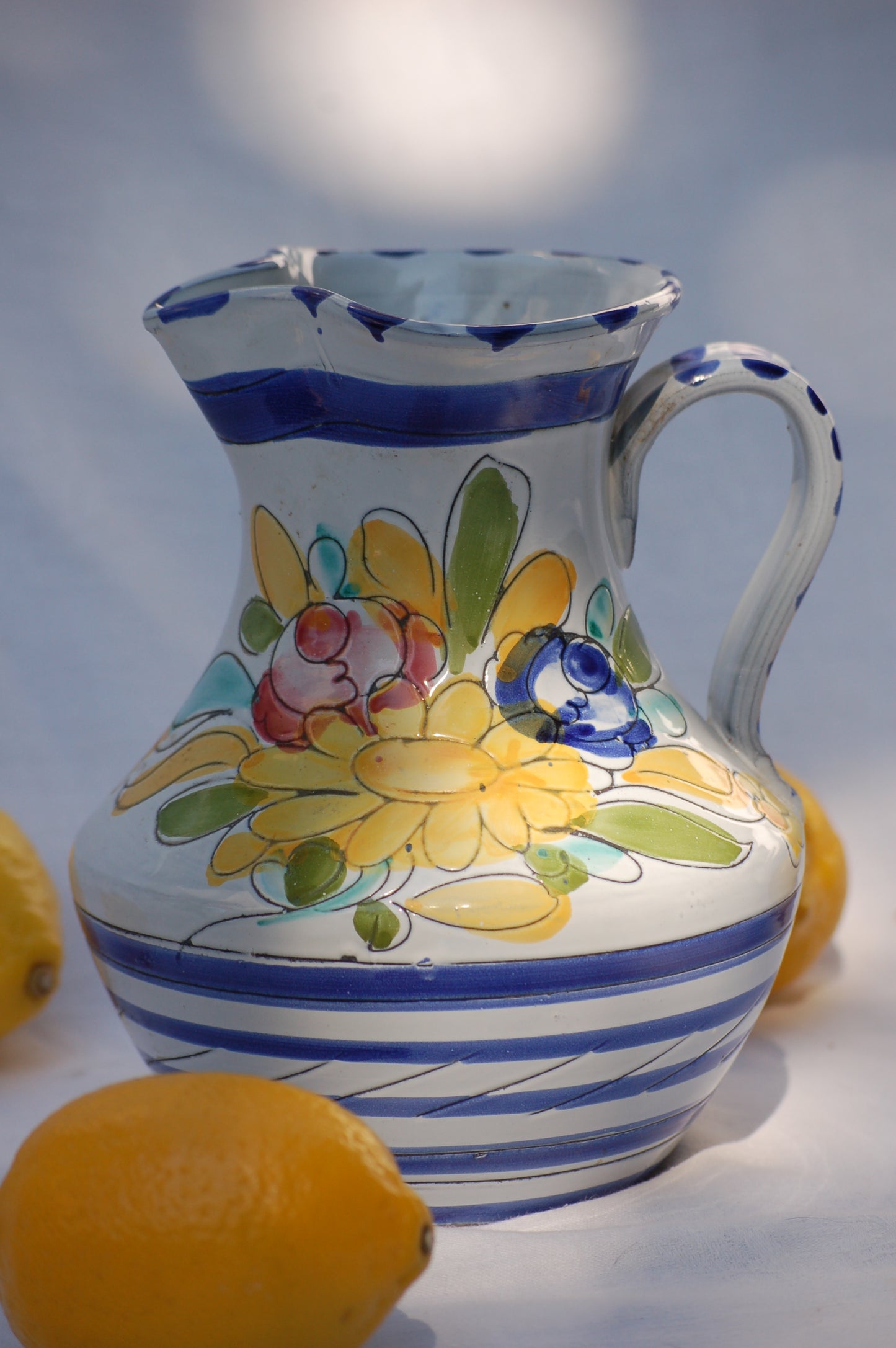©MediterraStyle For an instant feeling of, Mediterrenean table by the sea feeling, just add this cute pitcher on your table and the sun will shine. This vintage item is as new and comes from the 1980's. This pitcher comes from France. It is hand painted and has been drawn with scratched graffito technique which gives it a very lively look and feel. Loved and sold by Mediterra Style