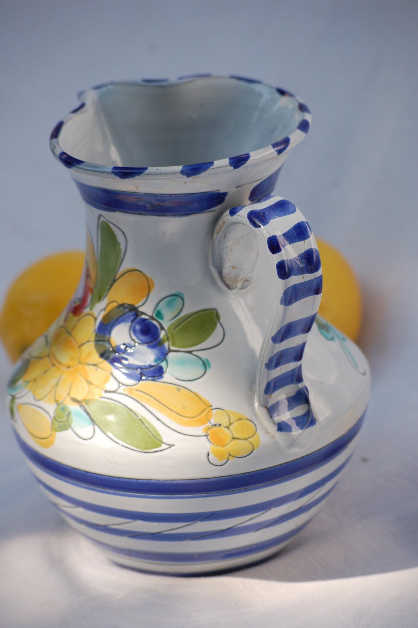 For an instant feeling of, Mediterrenean table by the sea feeling, just add this cute pitcher on your table and the sun will shine. This vintage item is as new and comes from the 1980's. This pitcher comes from France. It is hand painted and has been drawn with scratched graffito technique which gives it a very lively look and feel.