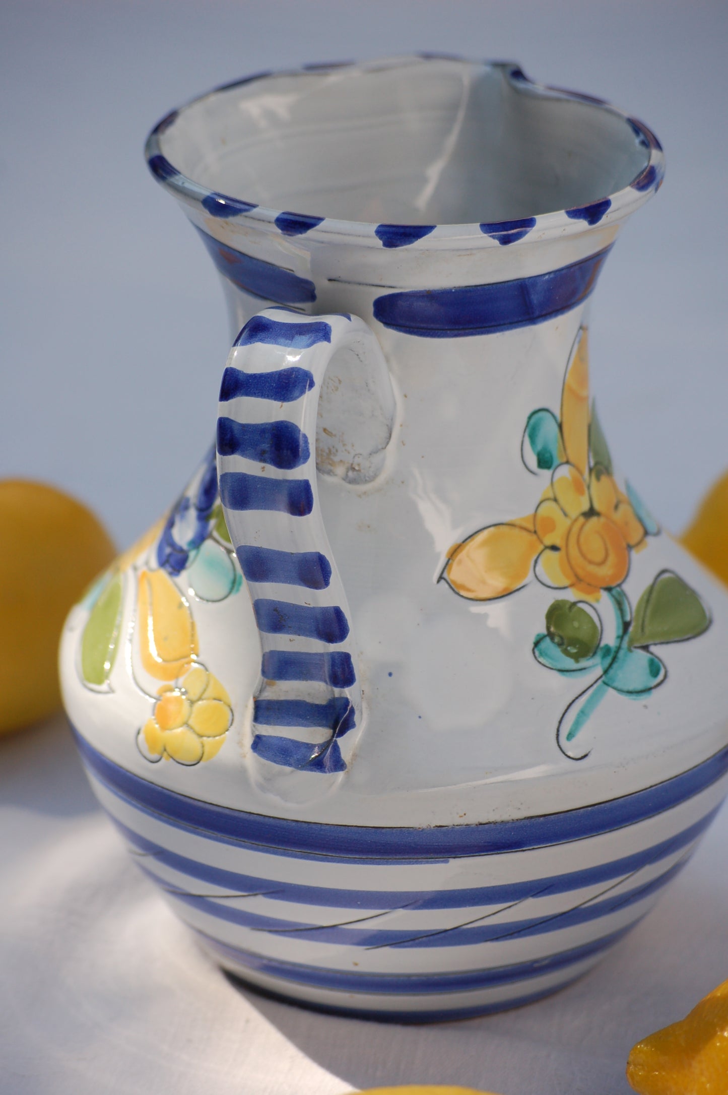 For an instant feeling of, Mediterrenean table by the sea feeling, just add this cute pitcher on your table and the sun will shine. This vintage item is as new and comes from the 1980's. This pitcher comes from France. It is hand painted and has been drawn with scratched graffito technique which gives it a very lively look and feel.