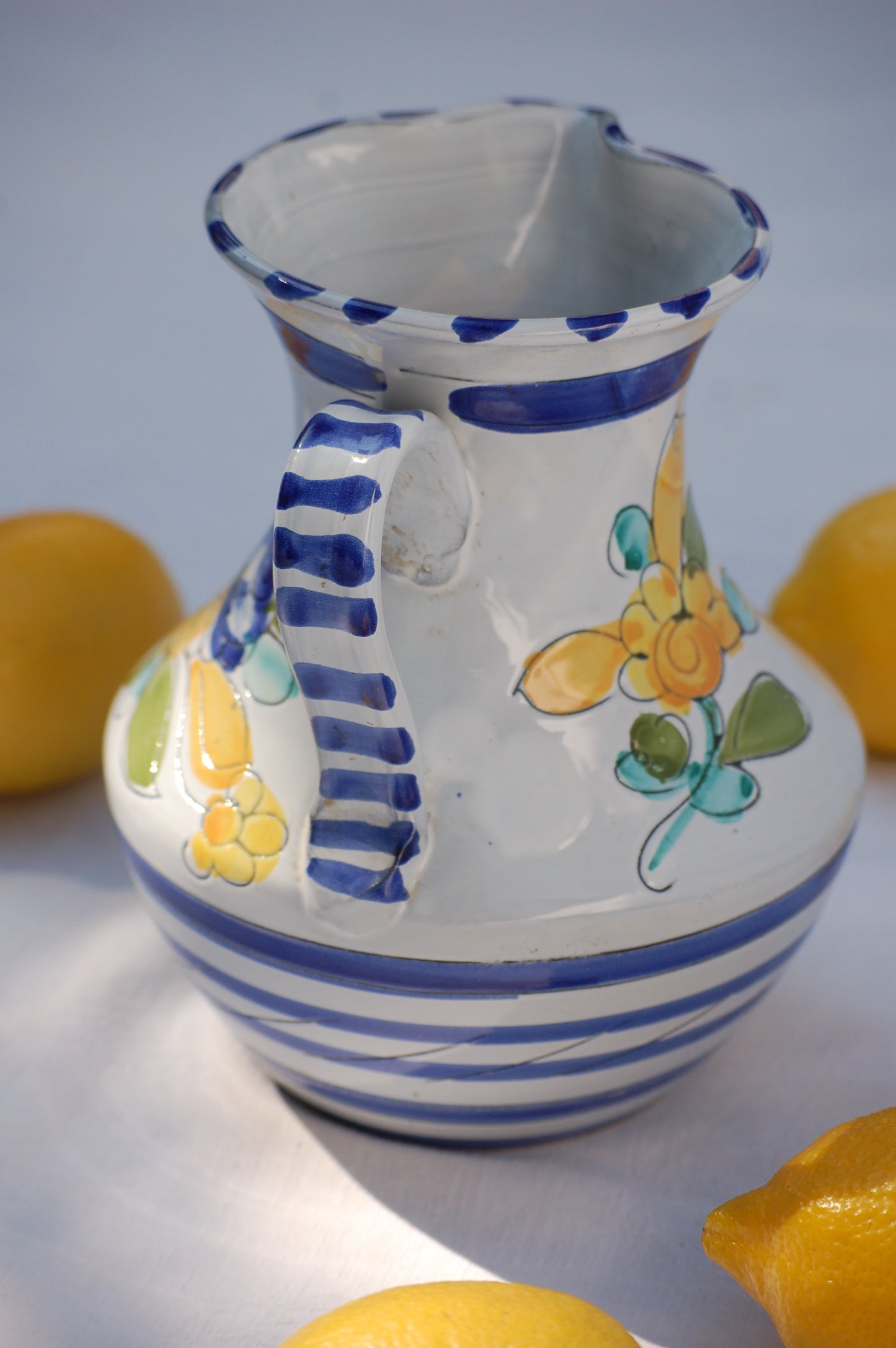 For an instant feeling of, Mediterrenean table by the sea feeling, just add this cute pitcher on your table and the sun will shine. This vintage item is as new and comes from the 1980's. This pitcher comes from France. It is hand painted and has been drawn with scratched graffito technique which gives it a very lively look and feel.