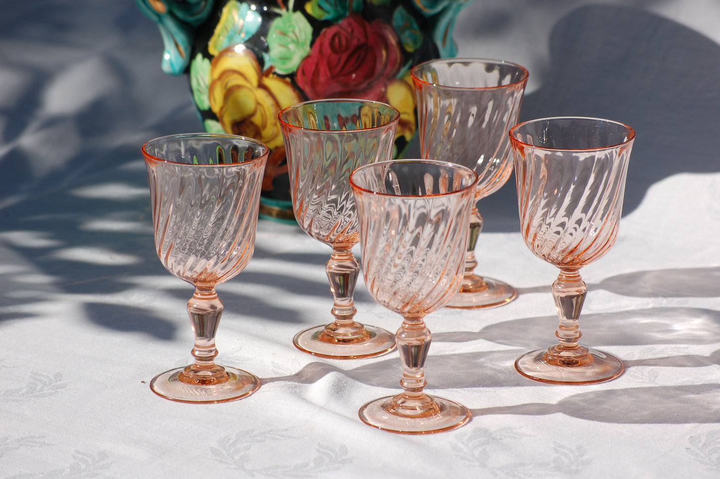 Set of 5 French vintage rosaline swirl wine glasses Luminarcfrom the seventies by Mediterrastyle. Set of 5 French vintage rosaline swirl wine glasses from the seventies. Have your rose in seventies mood with these colorfull and elegant glasses in a light rose color. French rosaline swirl wine glasses. Set of 5 glasses from Arcoroc Luminarc, France. ©MediterraStyle