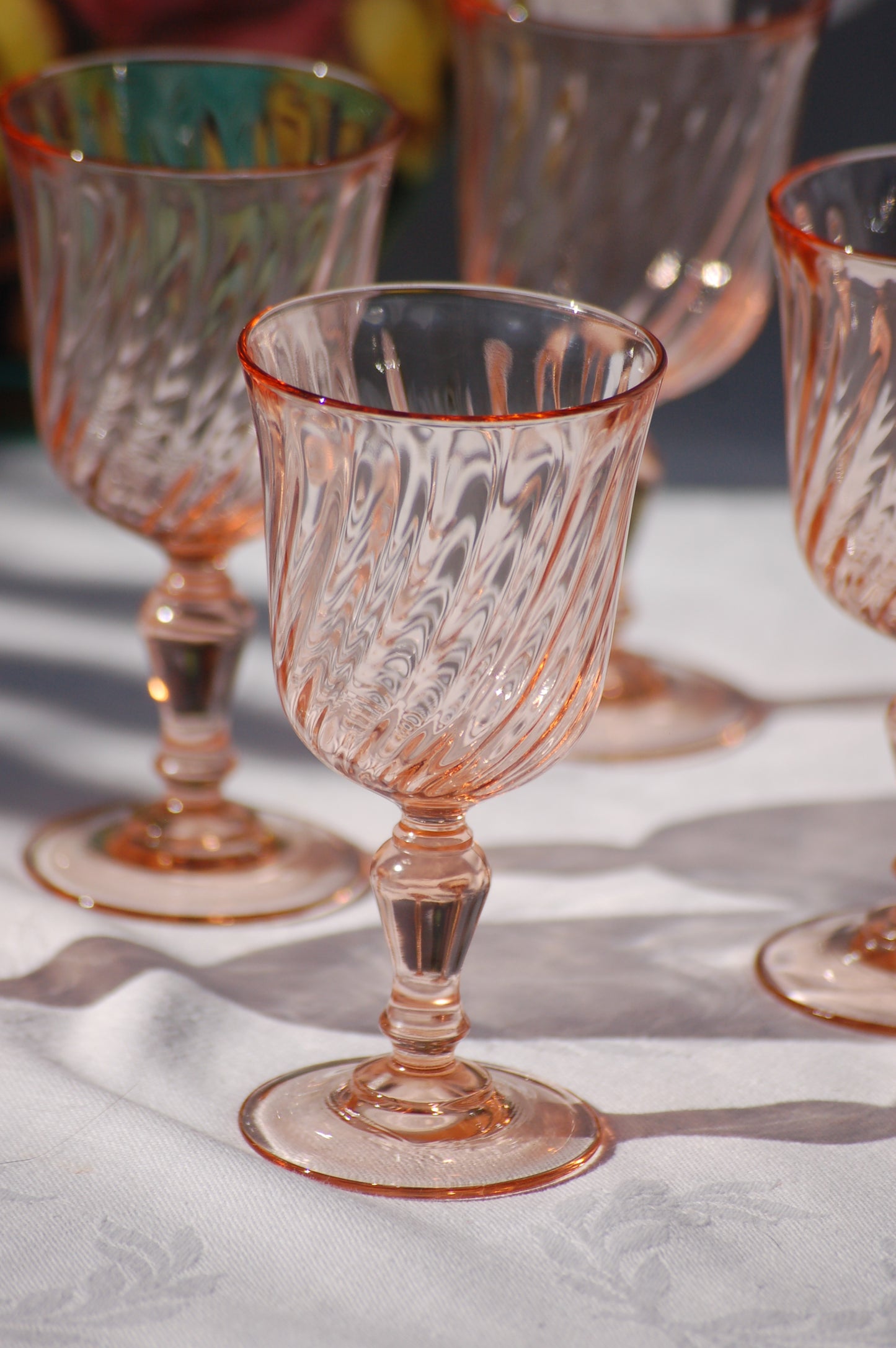 Set of 5 French vintage rosaline swirl wine glasses from the seventies. Have your rose in seventies mood with these colorfull and elegant glasses in a light rose color. French rosaline swirl wine glasses. Set of 5 glasses from Arcoroc Luminarc, France. ©MediterraStyle