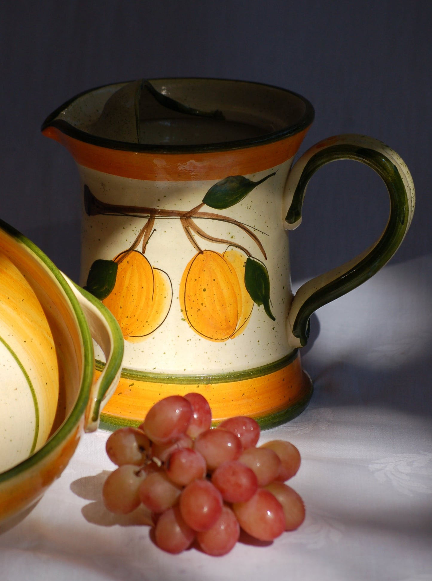 ©MediterraStyle A beautiful 1960s Provencal ceramic carafe with hand-painted decoration representing an apricot branch with its fruits. This caraf will put instant sunshine on your table. Vintage item is as new! Signed on the bottom. Loved and sold by Mediterra Style