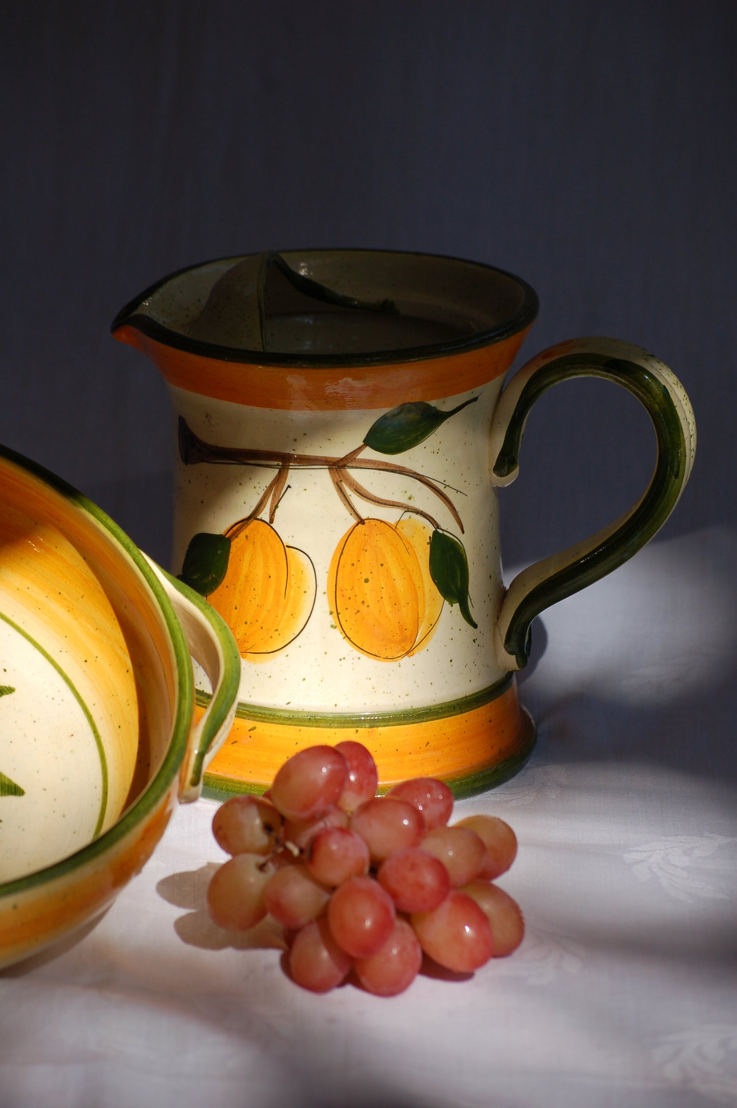©MediterraStyle A beautiful 1960s Provencal ceramic carafe with hand-painted decoration representing an apricot branch with its fruits. This caraf will put instant sunshine on your table. Vintage item is as new! Signed on the bottom. Loved and sold by Mediterra Style