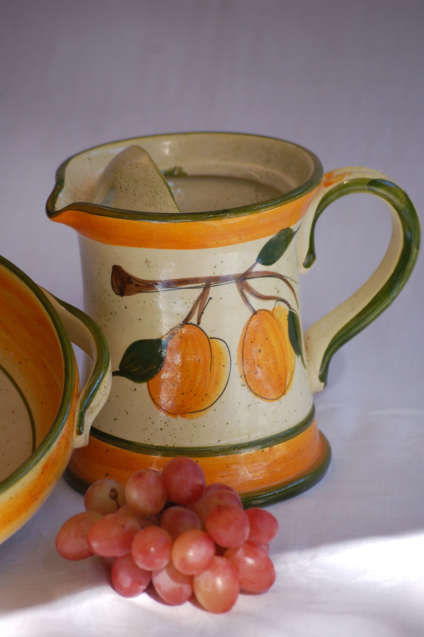 ©MediterraStyle A beautiful 1960s Provencal ceramic carafe with hand-painted decoration representing an apricot branch with its fruits. This caraf will put instant sunshine on your table. Vintage item is as new! Signed on the bottom. Loved and sold by Mediterra Style