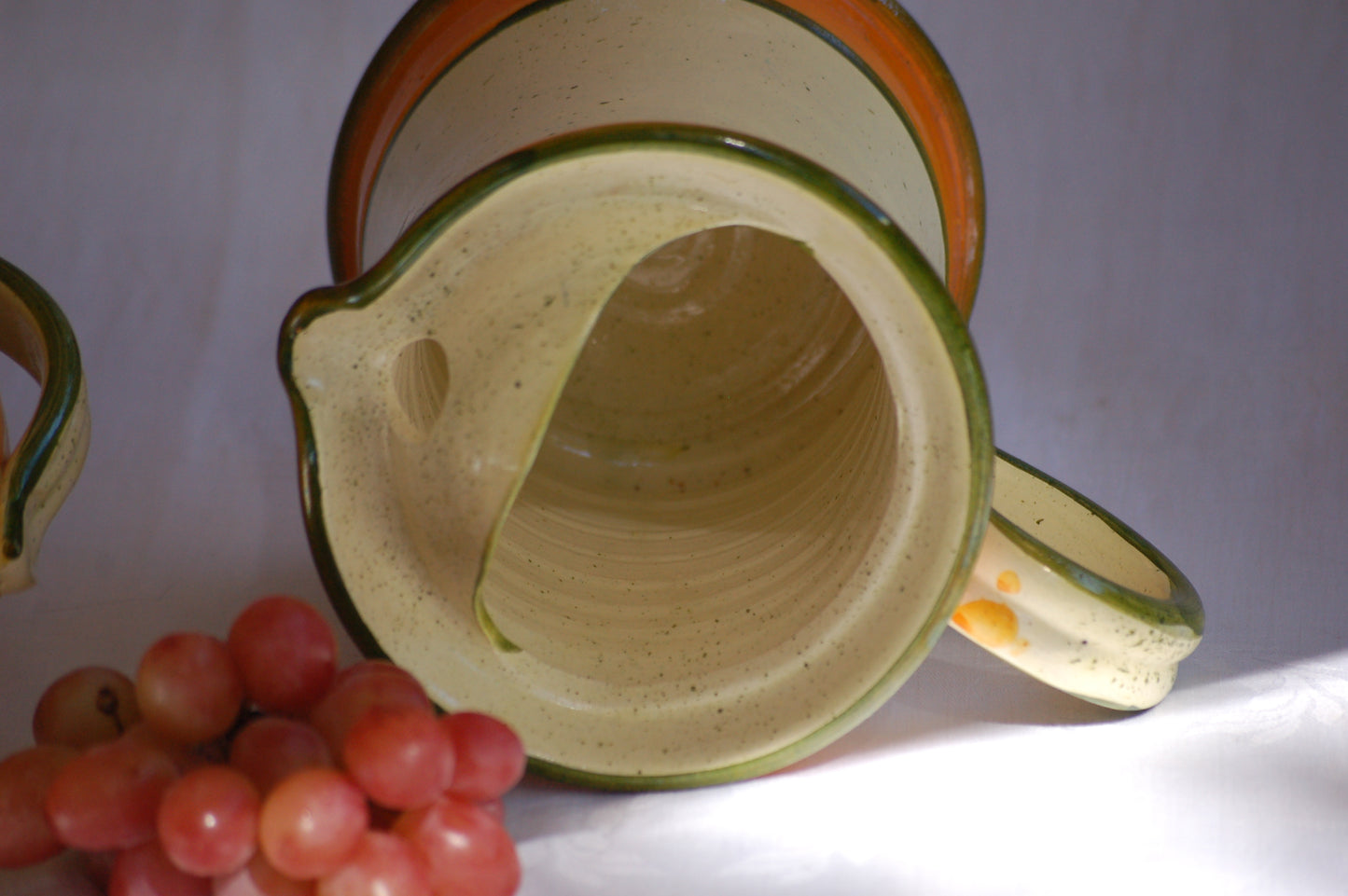 ©MediterraStyle A beautiful 1960s Provencal ceramic carafe with hand-painted decoration representing an apricot branch with its fruits. This caraf will put instant sunshine on your table. Vintage item is as new! Signed on the bottom. Loved and sold by Mediterra Style