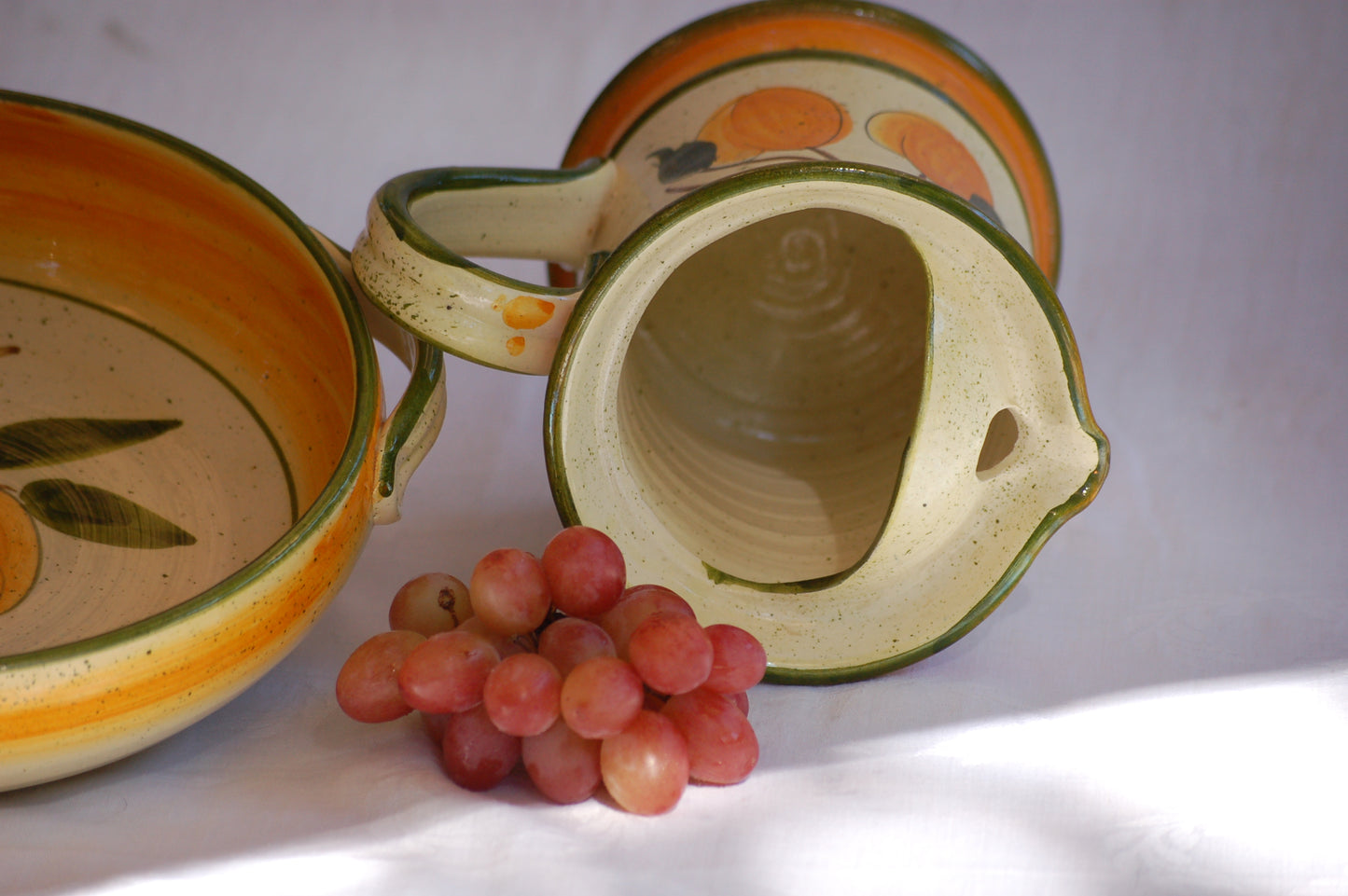 ©MediterraStyle A beautiful 1960s Provencal ceramic carafe with hand-painted decoration representing an apricot branch with its fruits. This caraf will put instant sunshine on your table. Vintage item is as new! Signed on the bottom. Loved and sold by Mediterra Style