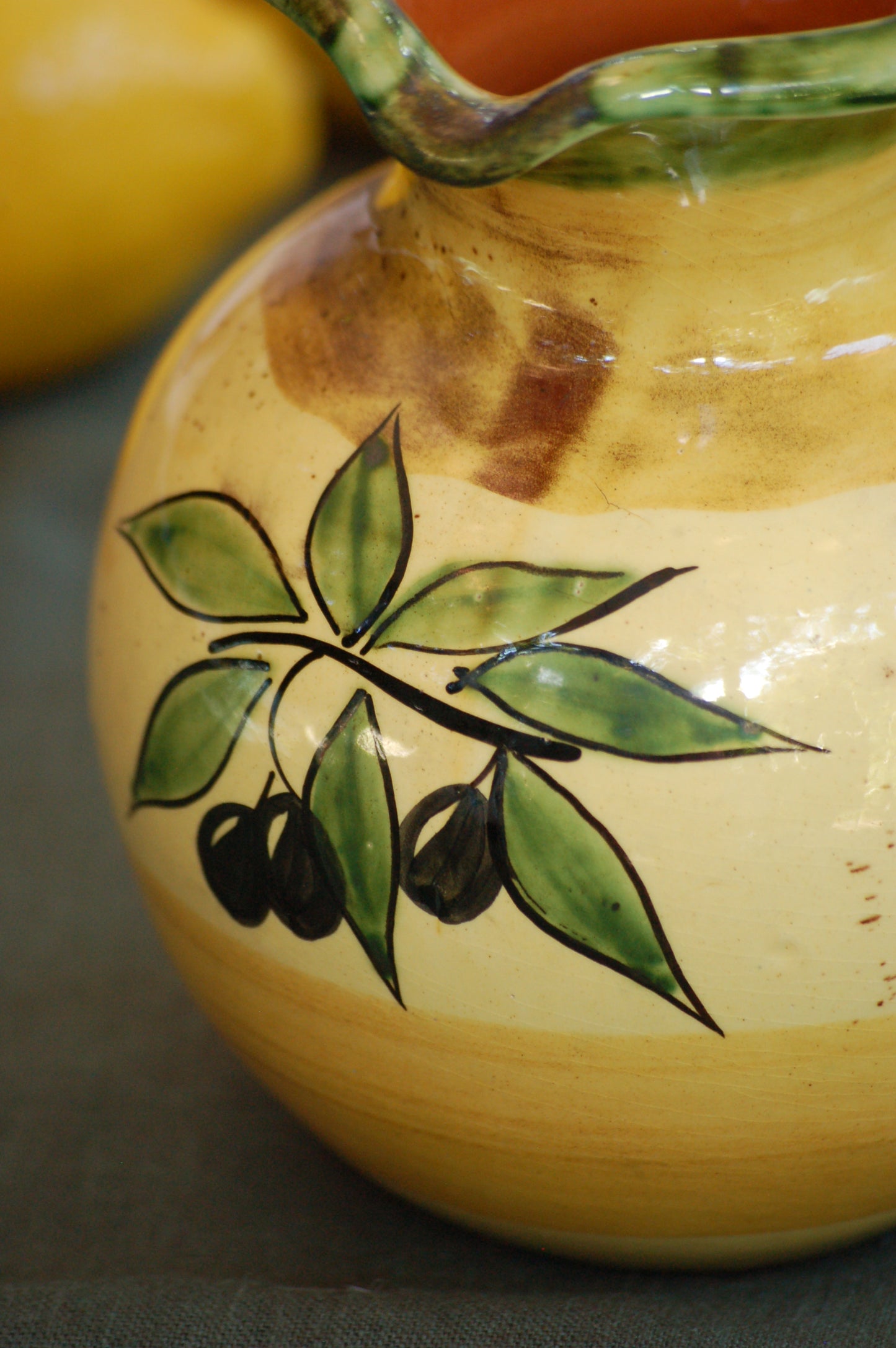 ©mediterraStyle A beautiful Provencal ceramic carafe with hand-painted decoration representing an olive branch with its fruits. This vintage item is as new and comes from the 1970's. Signed on the bottom: "Bd'A France' A beautifil warm colored addition to your kitchen. Loved and sold by MediterraStyle