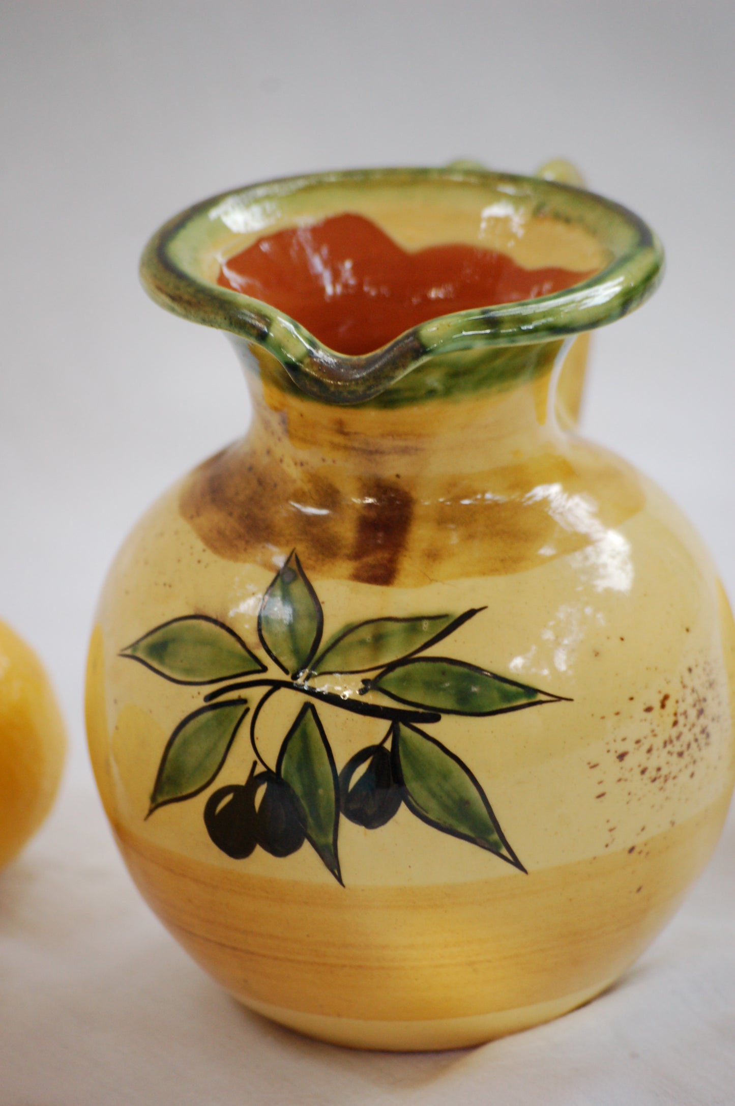 ©mediterraStyle A beautiful Provencal ceramic carafe with hand-painted decoration representing an olive branch with its fruits. This vintage item is as new and comes from the 1970's. Signed on the bottom: "Bd'A France' A beautifil warm colored addition to your kitchen. Loved and sold by MediterraStyle