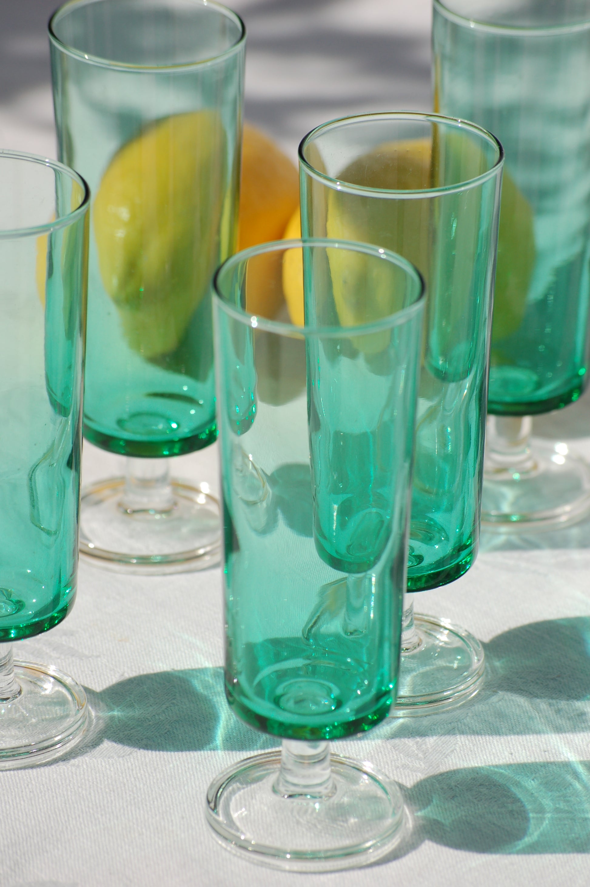 ©mediterraStyle Have your prosecco or champagne in seventies mood with these super cute and elegant glasses in a light emerald green. Set of six flutes from Luminarc, France. Beautiful effect if you combine the light green glasses with a darker green element or gold colored on the table. Like a caraf, vase or candleholder. Loved and sold by Mediterra Style