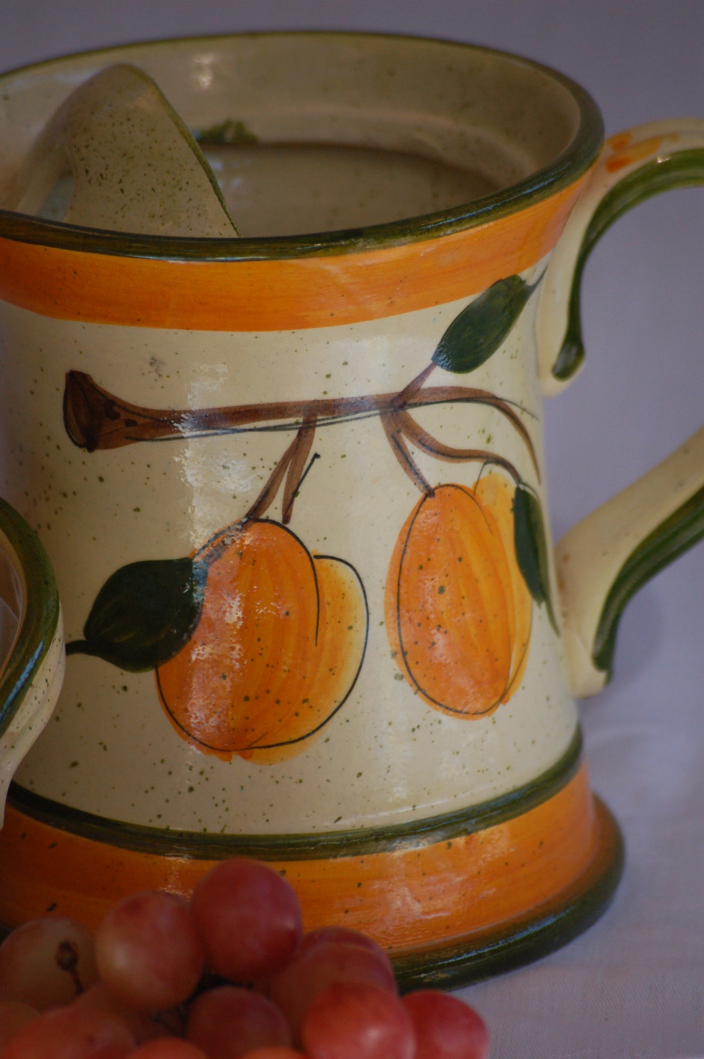 ©MediterraStyle A beautiful 1960s Provencal ceramic carafe with hand-painted decoration representing an apricot branch with its fruits. This caraf will put instant sunshine on your table. Vintage item is as new! Signed on the bottom. Loved and sold by Mediterra Style